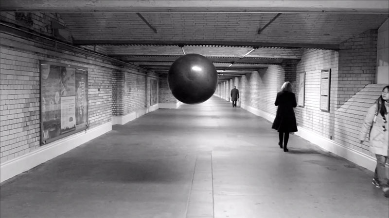 Space replay project - black balloon in metro station
